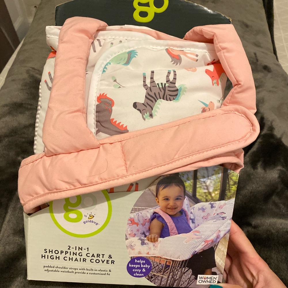 Shopping cart cover for baby girls.